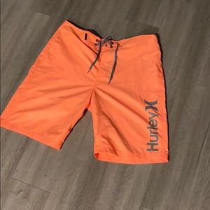Orange Hurley board shorts